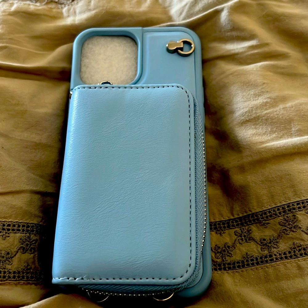 iPhone 13 Pro Max case with strap and card and money holder.